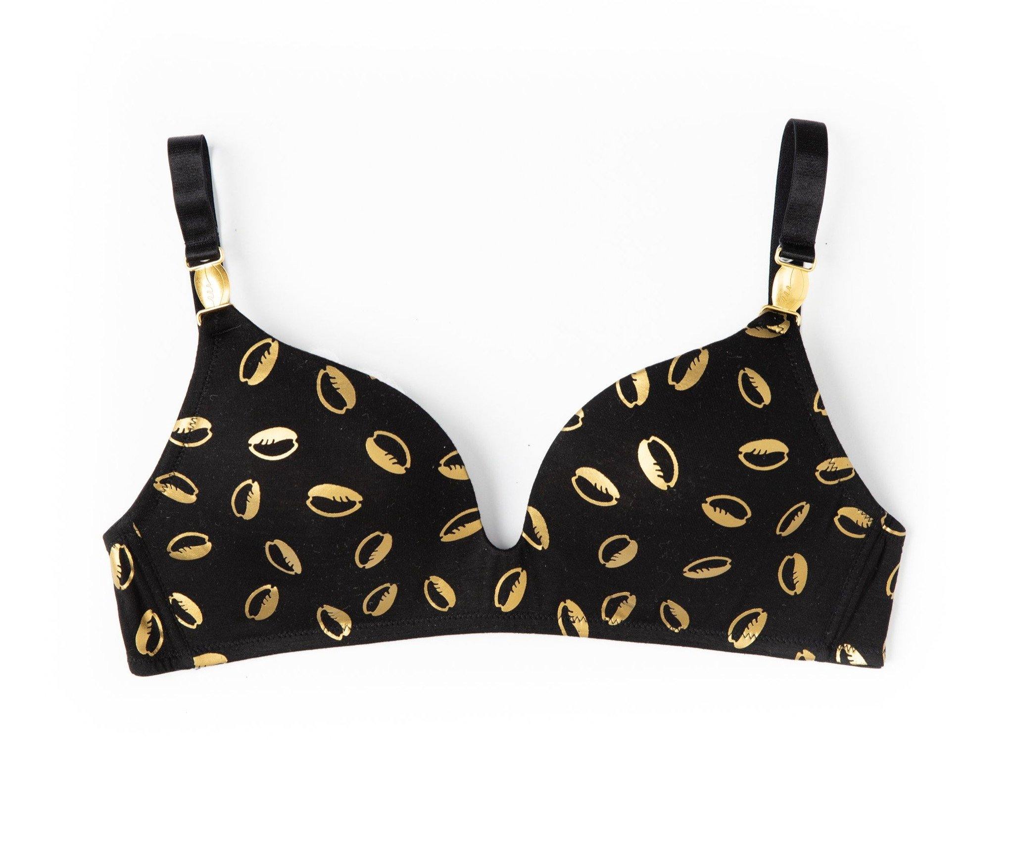front view of black ebony and ivory yemaya bra with gold cowrie shell print on white background