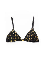 front view of black afro-caribbean inspired cowrie shell print bra on white background 